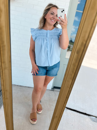 Lady in Blue Blouse